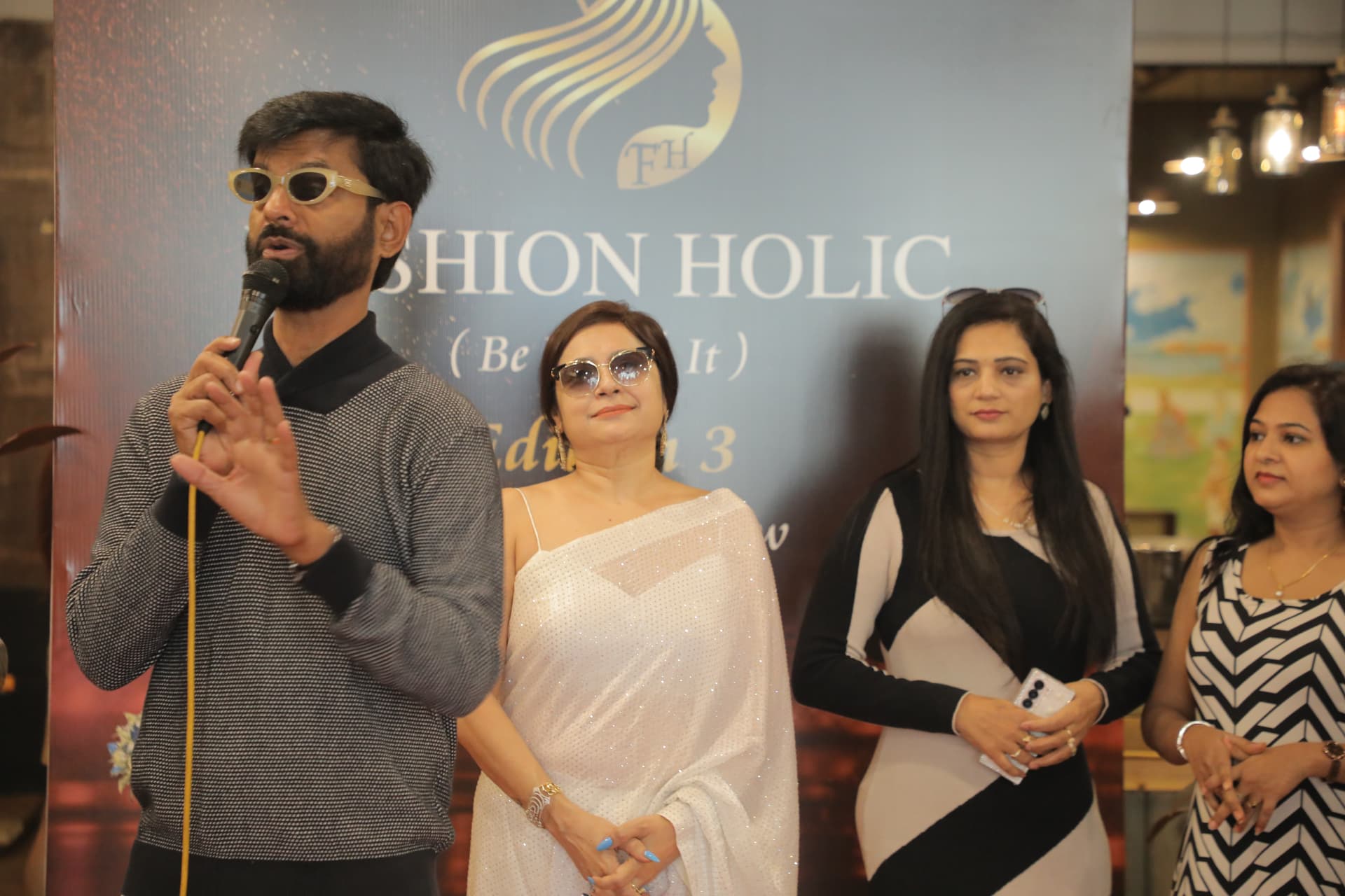 Guest speaker addressing the Fashion Holic audience