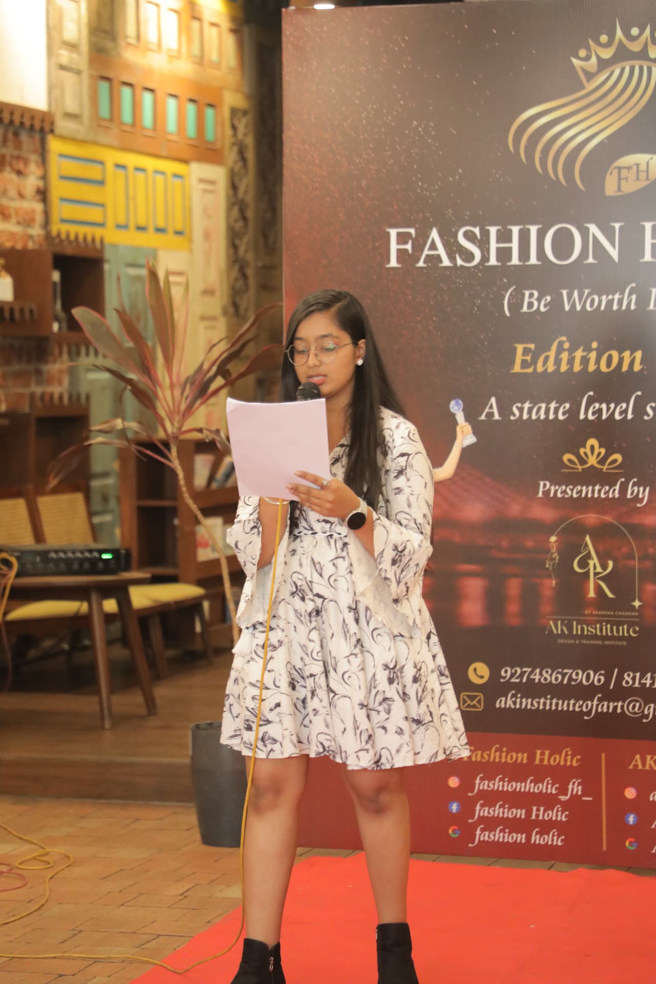 Anchor hosting the Fashion Holic Edition 3 state level show