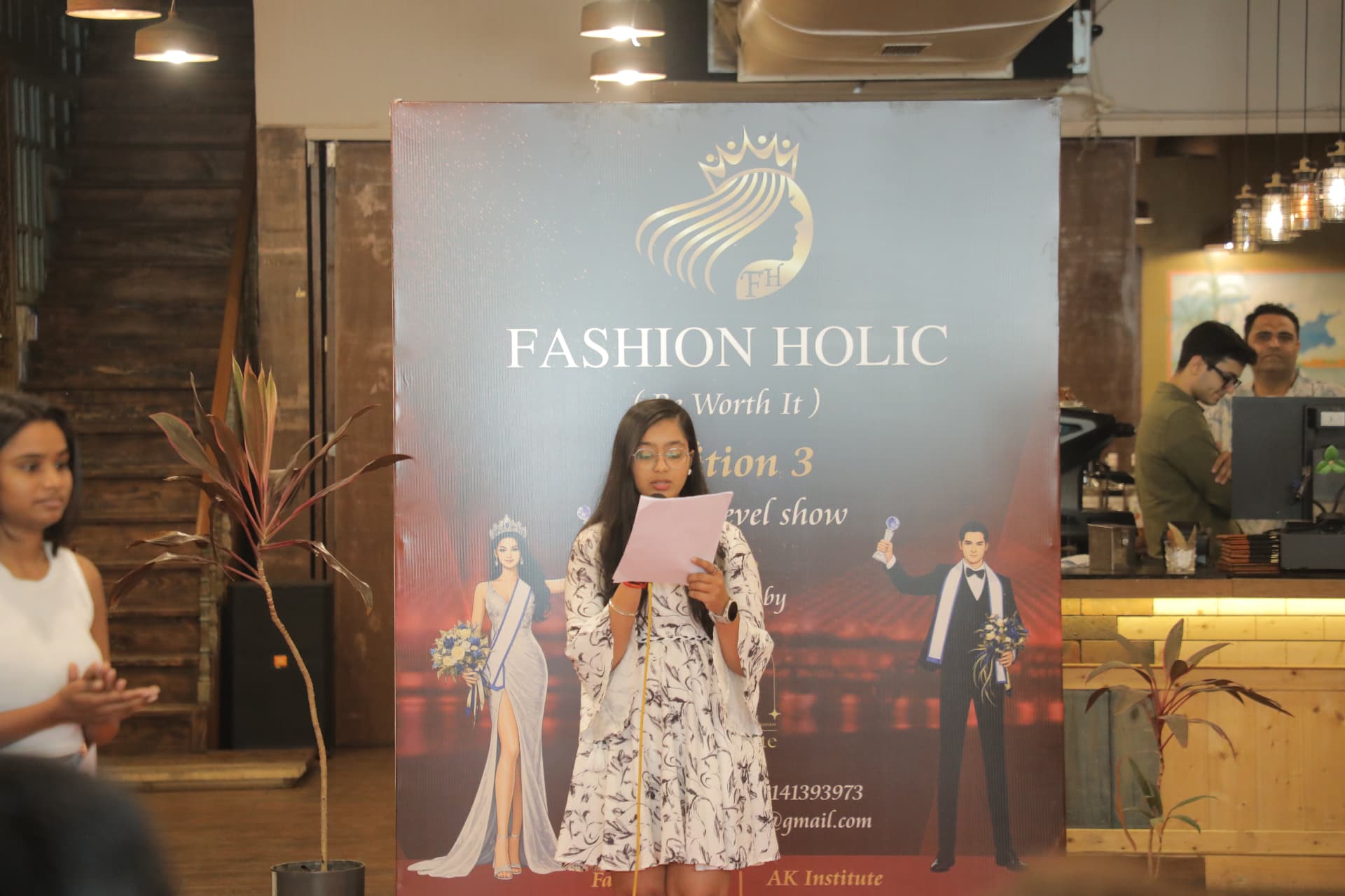 Fashion Holic Edition 3 stage backdrop with the host