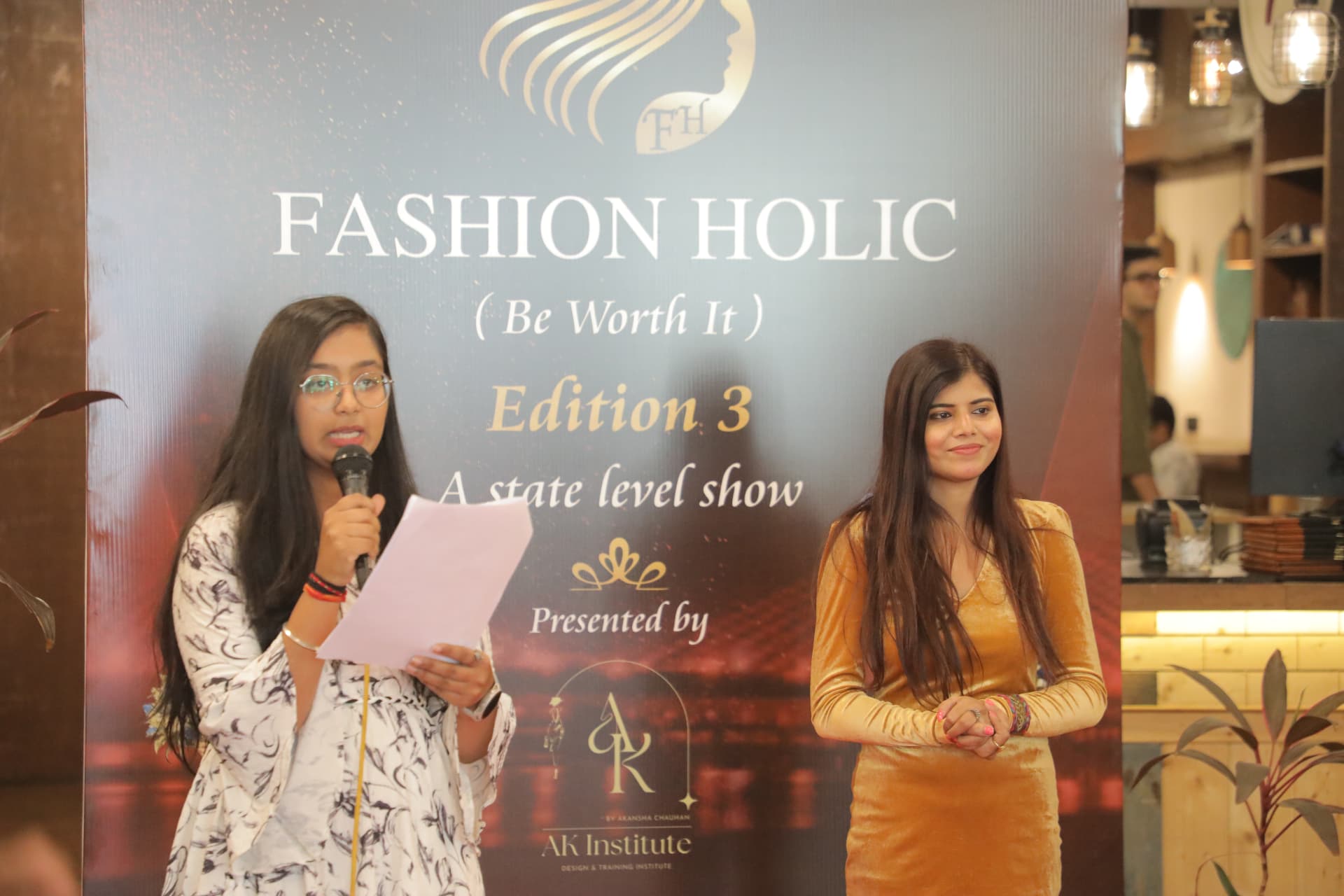 Hosts on stage at the Fashion Holic Edition 3 show